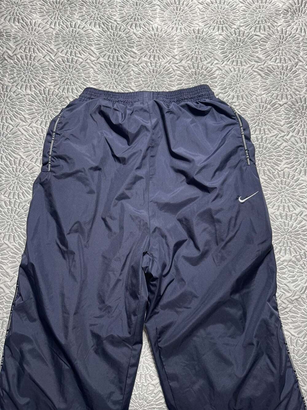Nike Women’s XL Navy Blue Fleece-Lined Nylon Track Pants with Side Stripe Logo